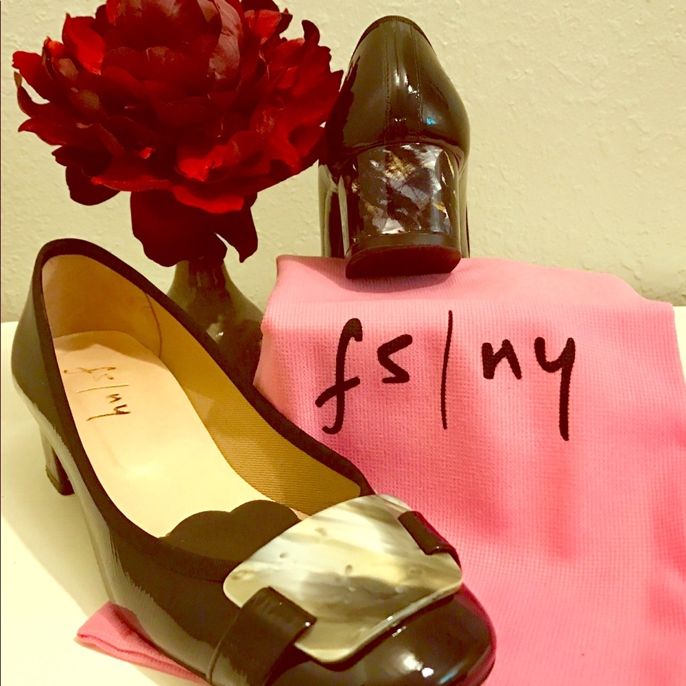 Gorgeous 2 inch stacked heel. Black patent leather